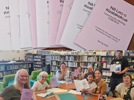 bound pamphlet book and group of people holding completed bound books.