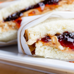 peanut butter and jelly sandwich on plate