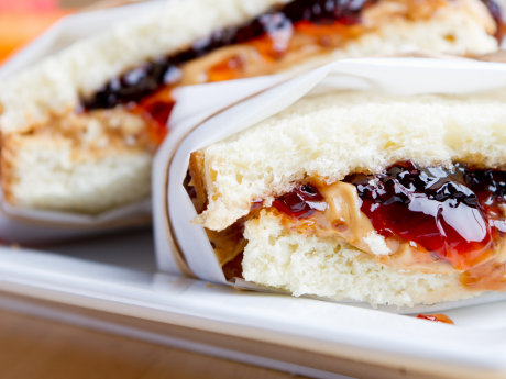 peanut butter and jelly sandwich on plate