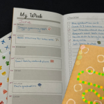 mini weekly planner with stickers and cover decorated with giraffe and dot stickers
