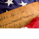 Declaration of Independence and American flag