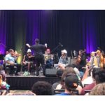 Orchestral musical group playing instruments in anime costume