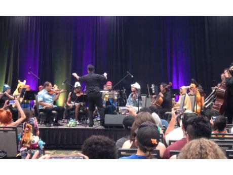 Orchestral musical group playing instruments in anime costume