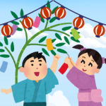 Boy and girl making wishes at a summer festival