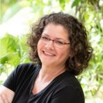 smiling woman with glasses
