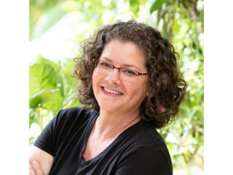 smiling woman with glasses