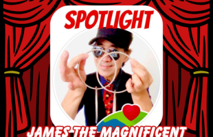 Magician with red curtain stage behind them
