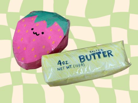 A pink strawberry squishy and a butter squishy made out of paper