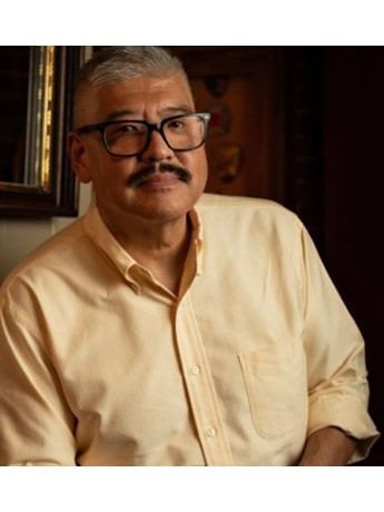 Portrait of male author Scott Kikkawa wearing button-down shirt