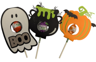 white ghost, black cauldron and orange pumpkin lollipop holders