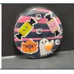 button decorated with candy and ghosts