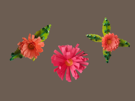 Three quilled flowers in green, pink and peach